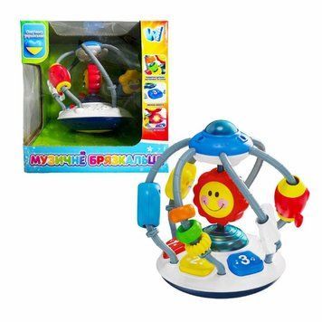 Игра Музыкальная погремушка (39924) УКР, звуки, подвижные элементы, в коробке настольная игра и пример комплектации | Sylarozumu.com.ua